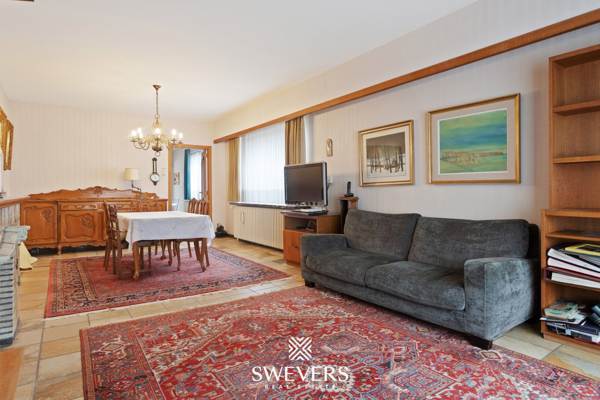 Open bebouwing met 4 slaapkamers, kelder en tuin in rustige, doodlopende straat foto 3