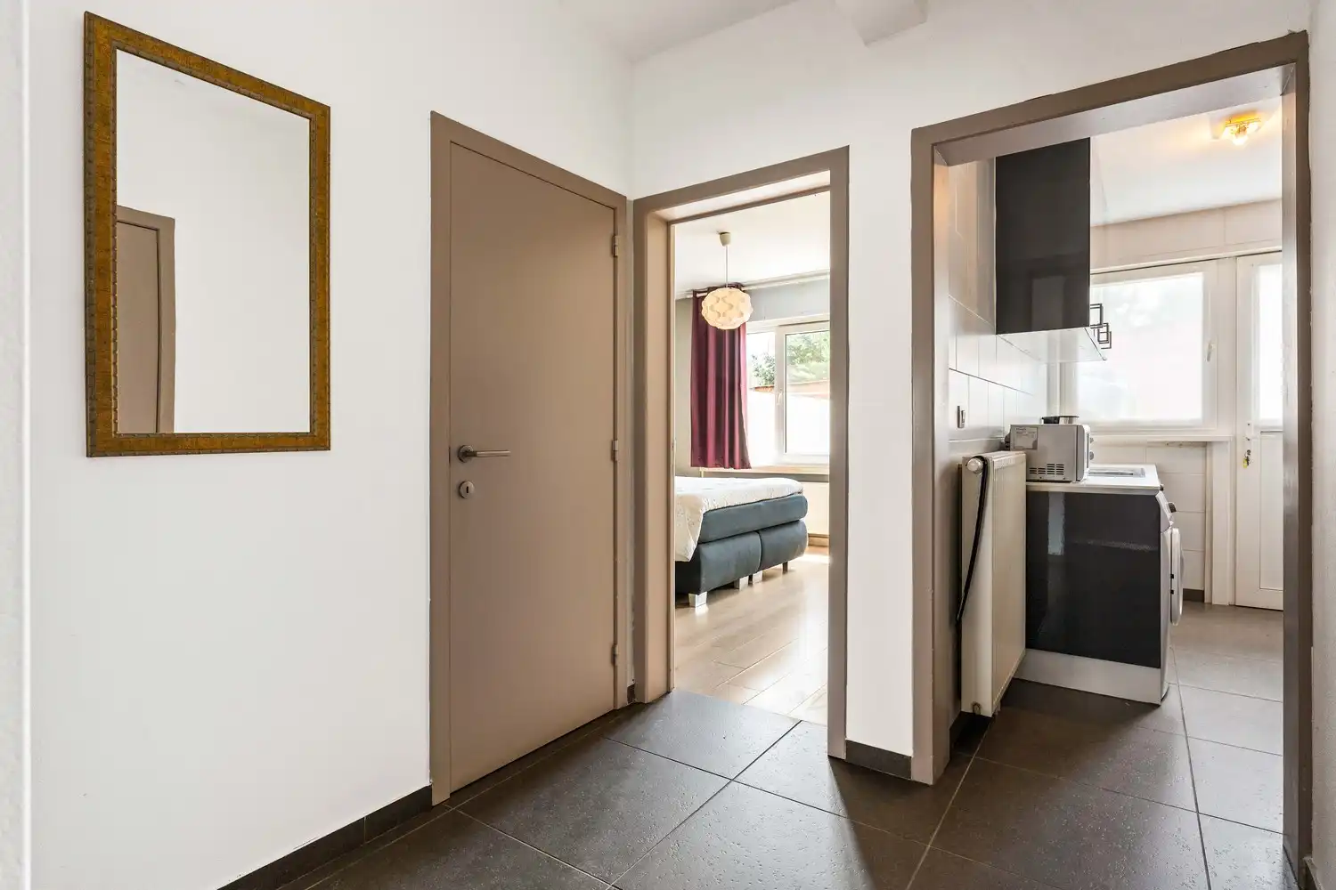 Instapklaar gelijkvloers appartement met zonnige tuin foto 5
