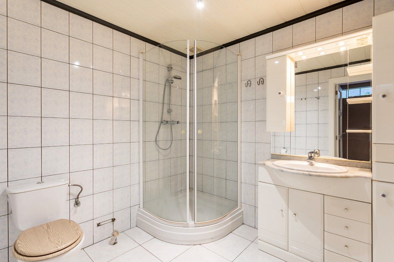 Ruim gelijkvloersapp te koop centrum Halle met 1 à 2 slpk, garage en tuin foto 13