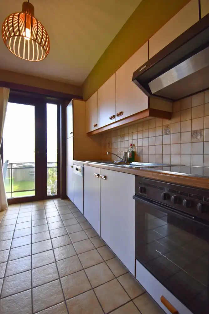 Gezellig 2-kamer appartement met terras én tuin foto 6