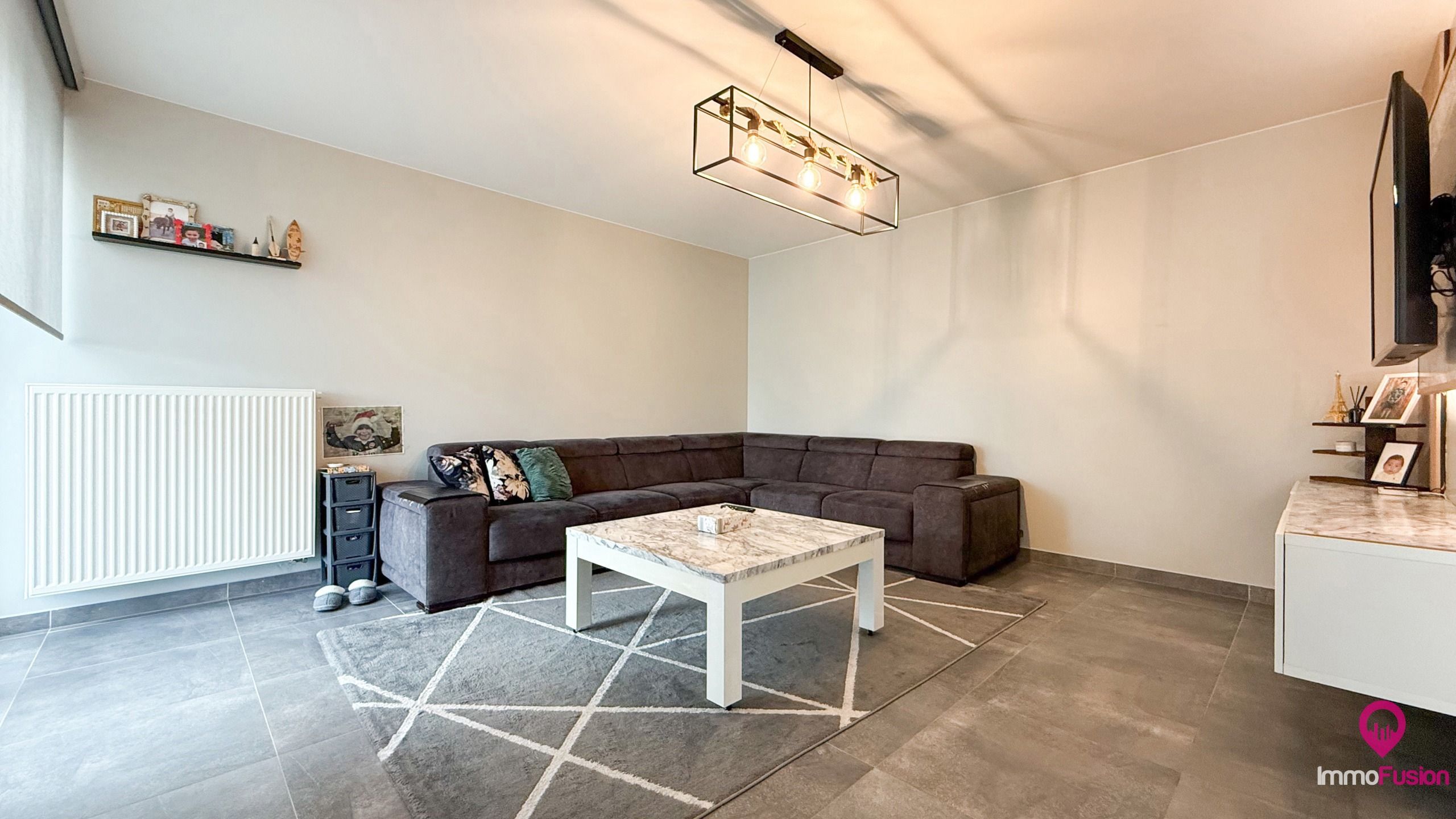 Recente halfopen woning met 2slpk en mooi tuin in Boekt! foto 2