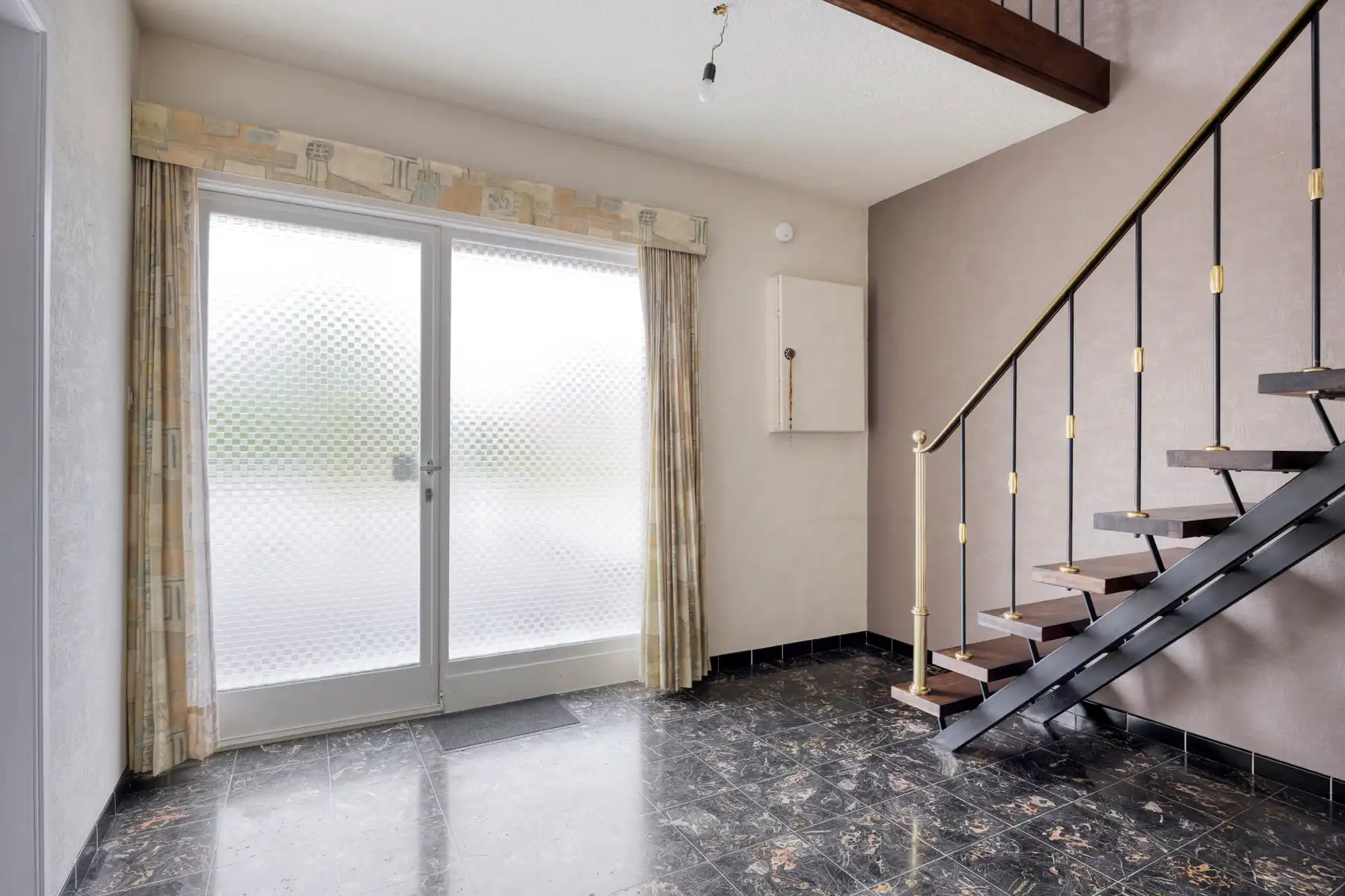 Woning met renovatiepotentieel in het centrum van Hechtel! foto 2
