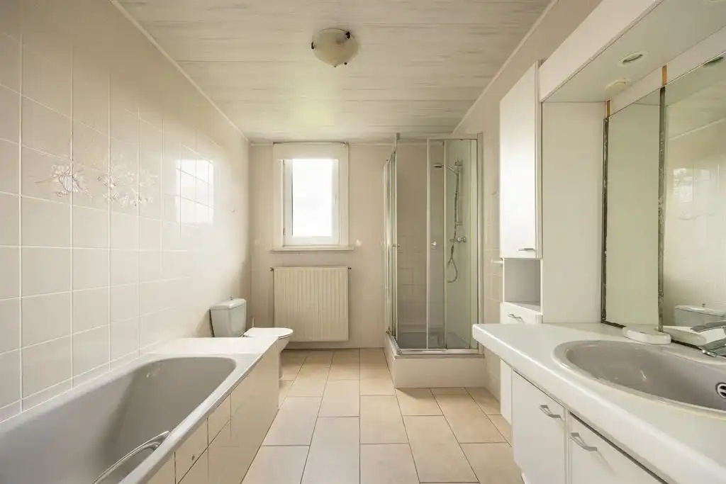 Instapklare woning met zonnige tuin in Deurne foto 24