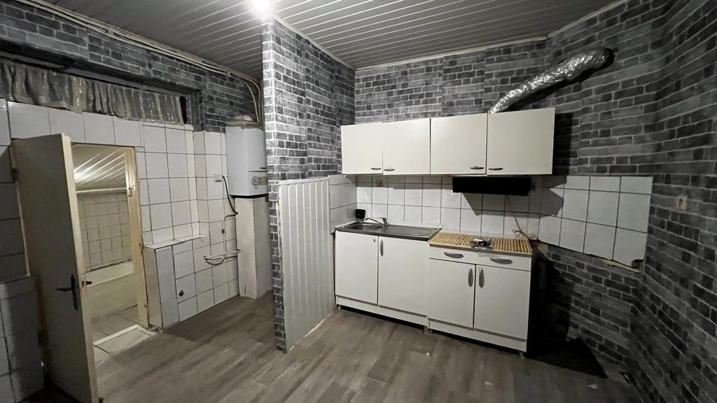 Te renoveren appartement(en) in het hartje van Maasmechelen foto 6