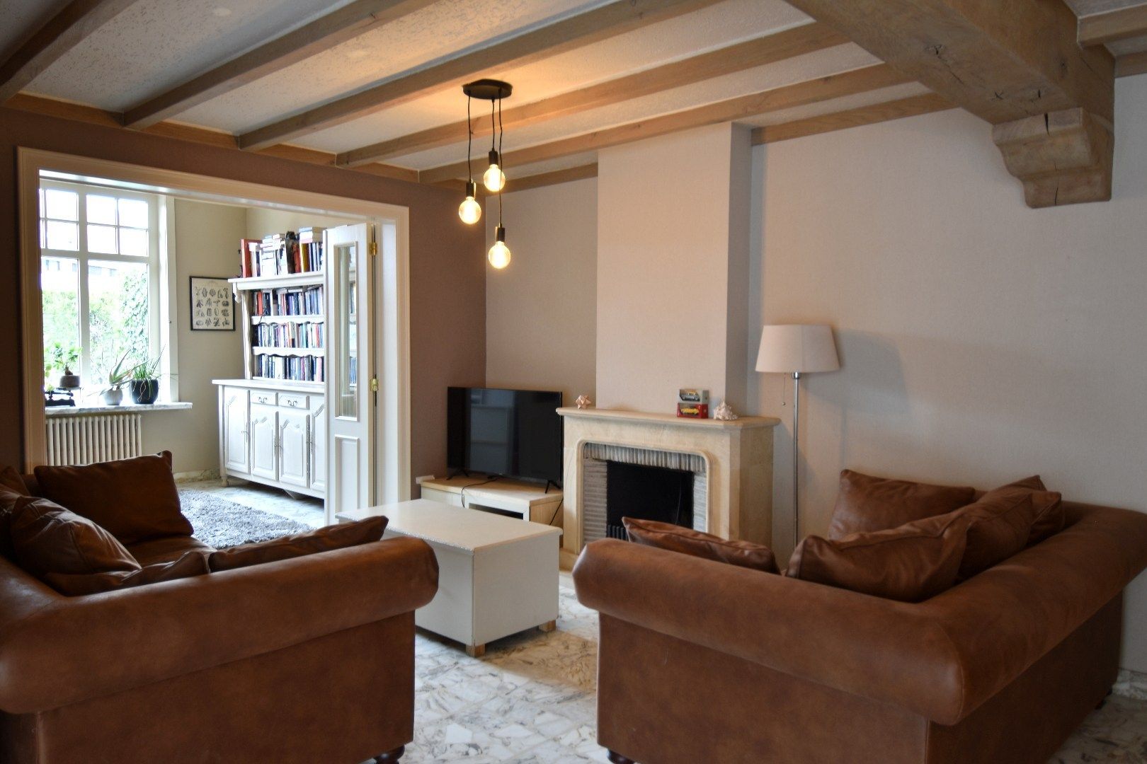 Charmante alleenstaande woning met 3 slaapkamers, tuin en garage in een rustige straat te Rollegem foto 3