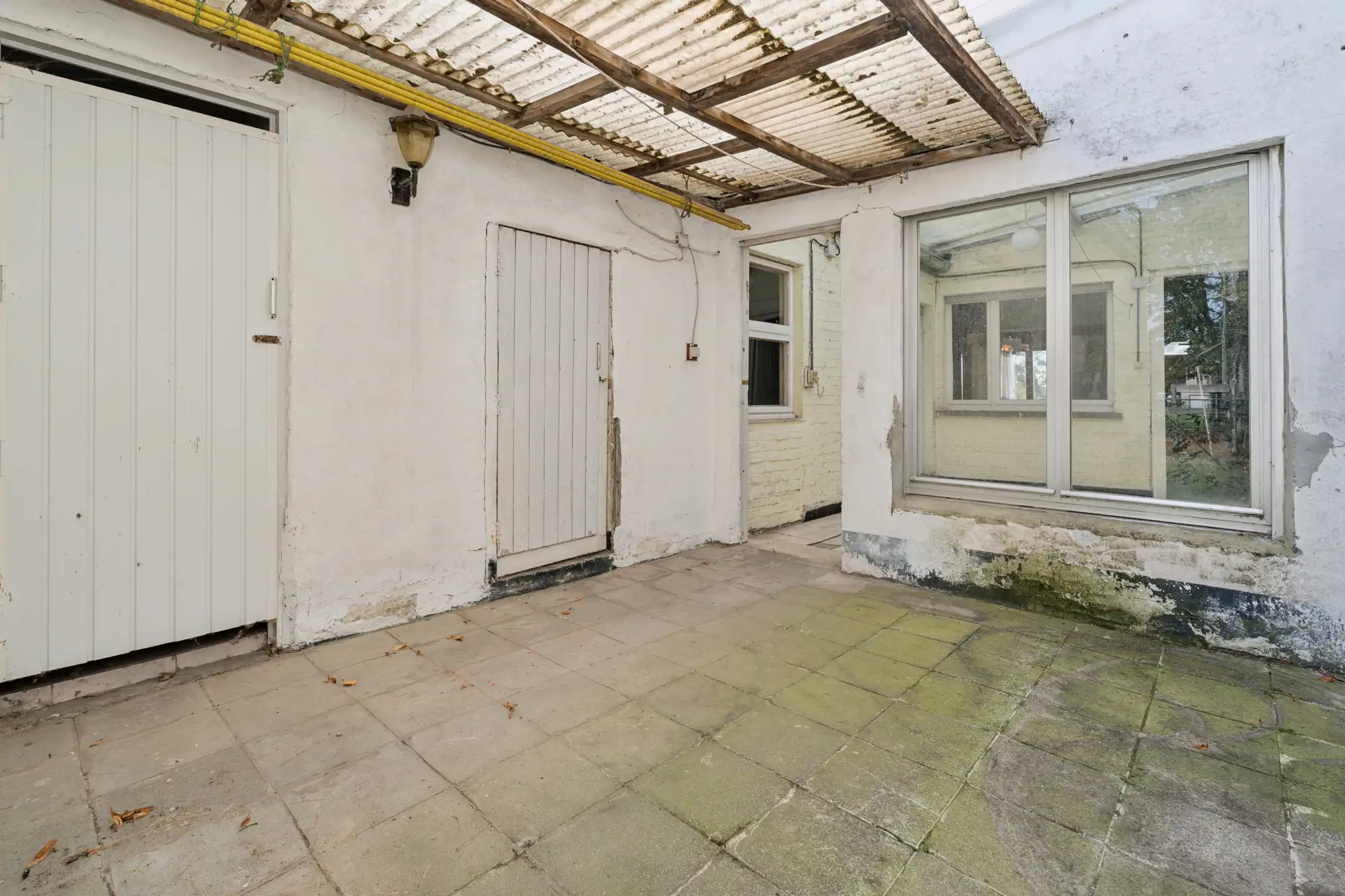 Te renoveren woning met tuin op centrale ligging foto 11