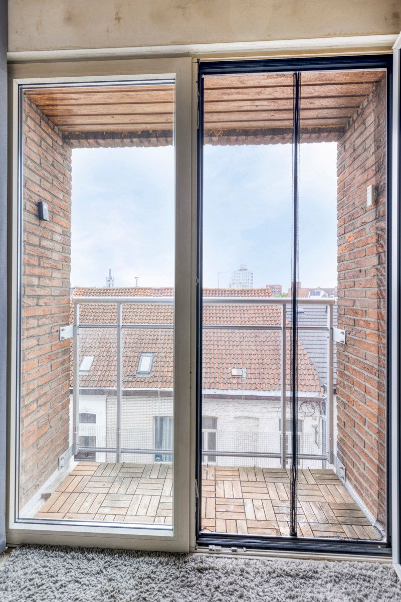 Gezellig instapklaar appartement met ondergrondse standplaats ! foto 13