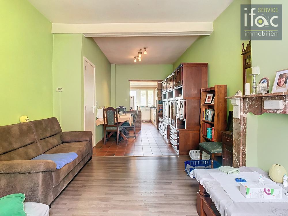 Rijhuis te koop foto 2