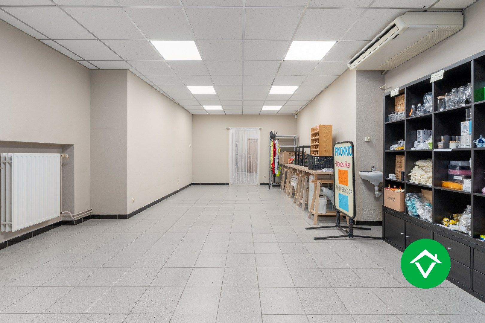 Veelzijdig handelspand met woonst en twee verhuurde appartementen in centrum Aartrijke foto 5