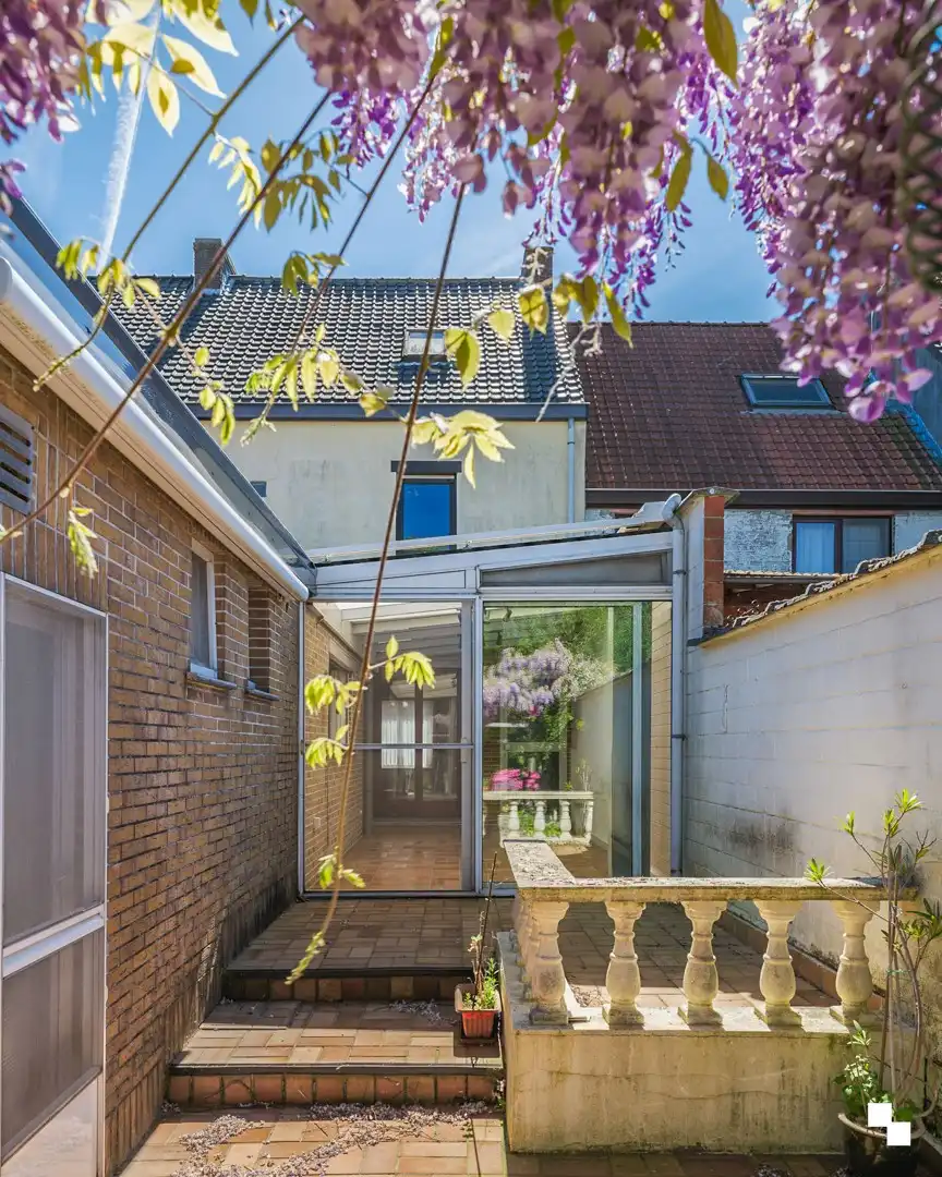 Te renoveren woning met gezellige tuin in het hart van Merelbeke foto 19
