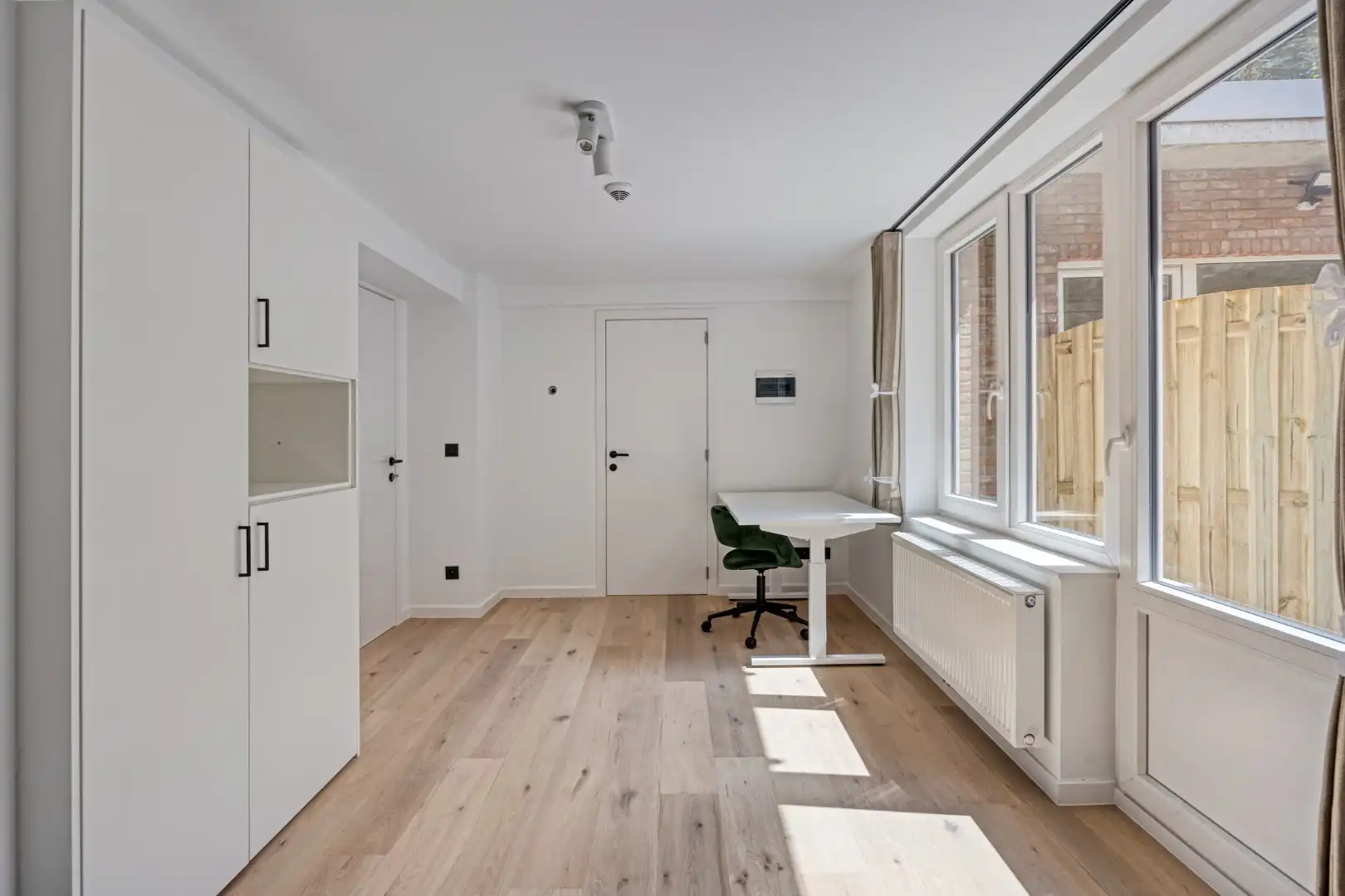 Volledig gerenoveerde studentenkamer in residentie met 29 studentenkamers met eigen sanitair en terras in hartje Leuven - EPC label A! foto 11