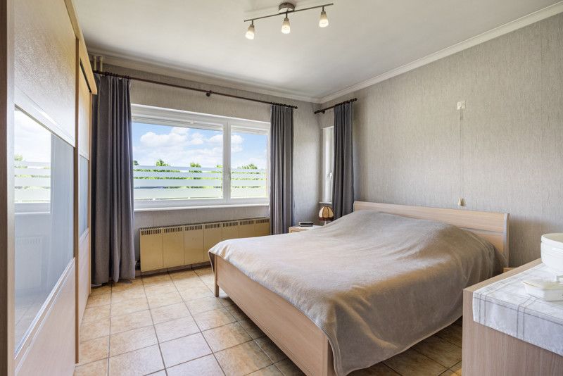 Ruime woning met loods op een perceel van 14are foto 14