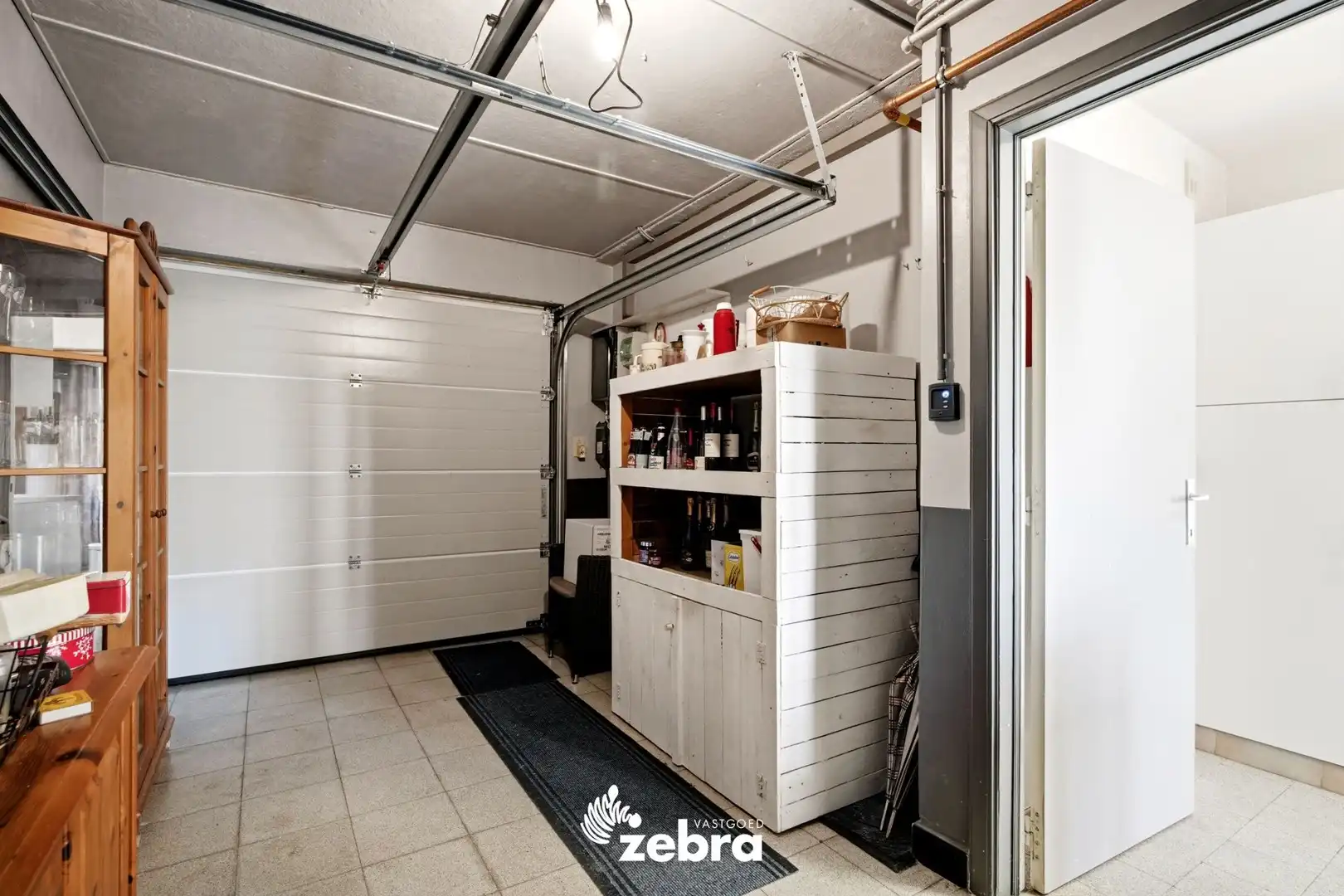 Ruime gezinswoning met 3 slaapkamers, ingerichte zolder, garage en tuin! foto 20