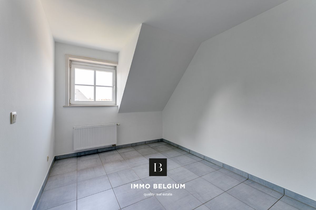 Ruim duplex appartement met 3 slaapkamers foto 2