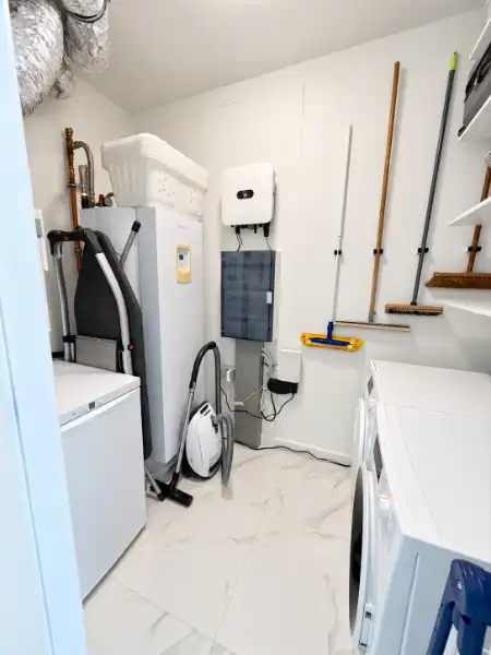 Luxueus designappartement met zuidterras, carport en ruime kelder foto 15