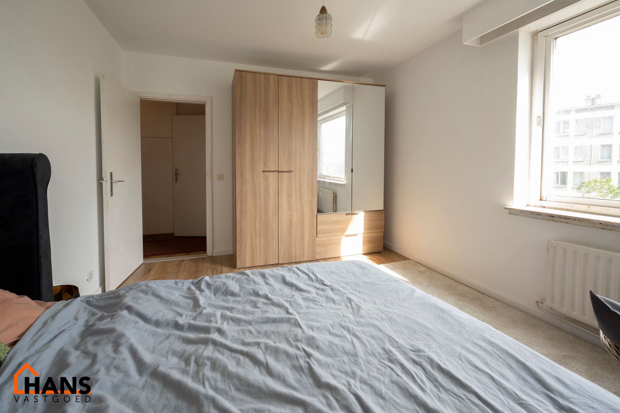 Riant appartement + staanplaats + kelder foto 7