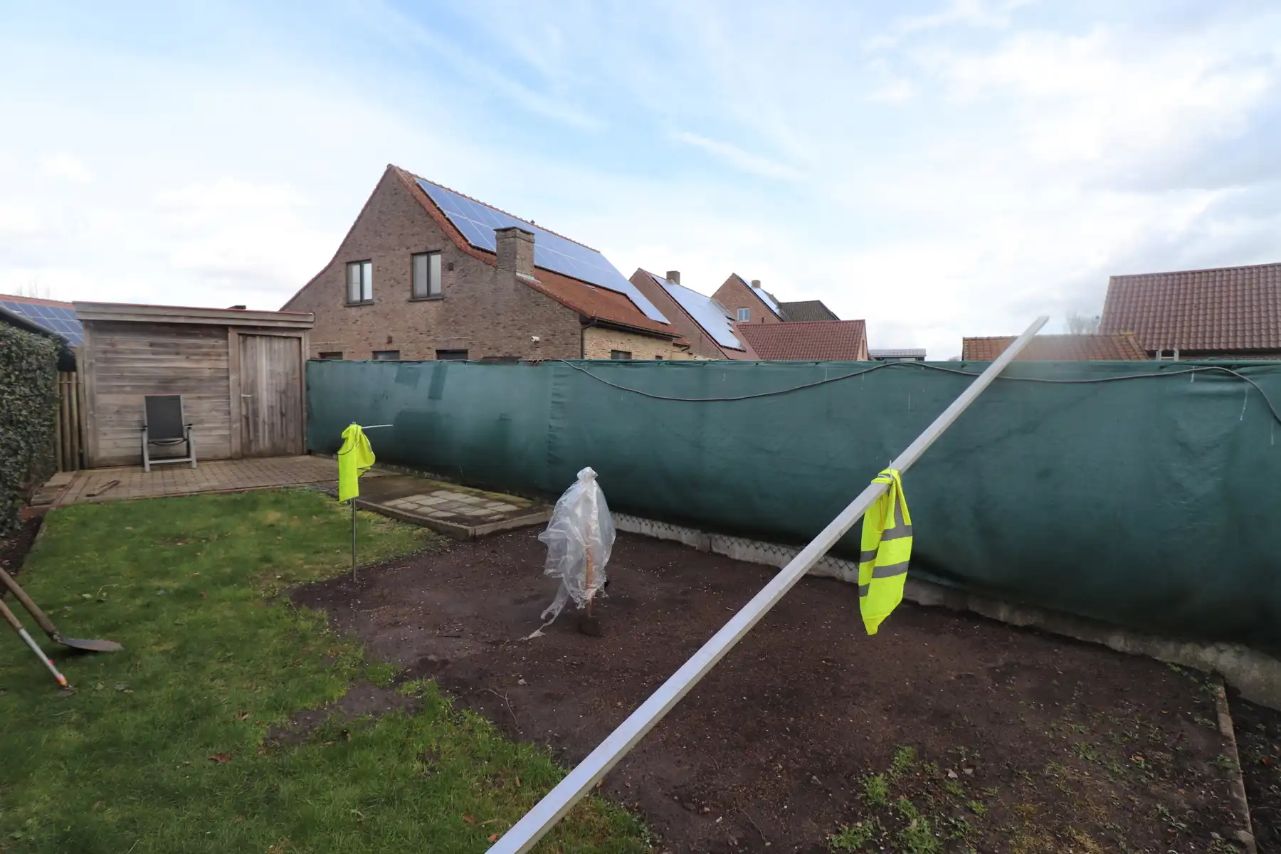 Appartement op de 1ste verdieping met carport/tuinberging en terras met tuin. foto 17