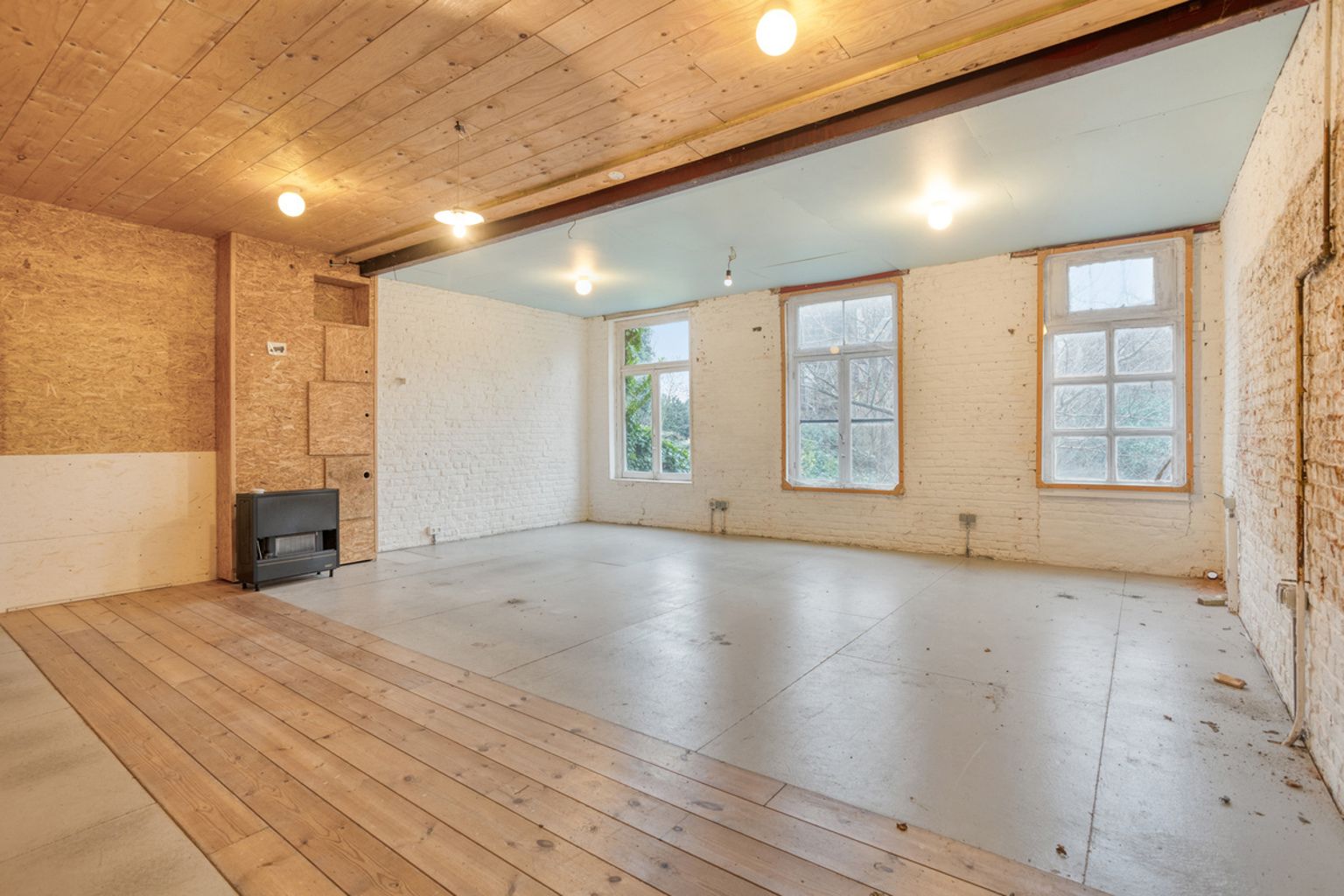 Commercieel gelijkvloers met achterliggend werkplaats foto 9