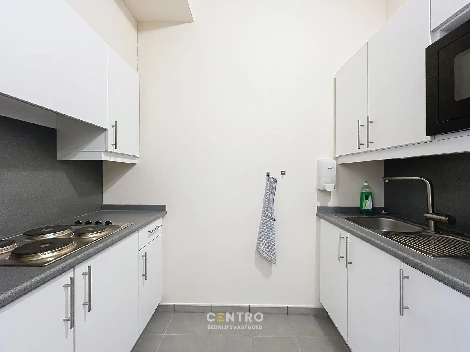 Energiezuinig WINKELPAND met industriële uitstraling in de Delaerestraat tussen stijlvolle handelszaken. foto 14