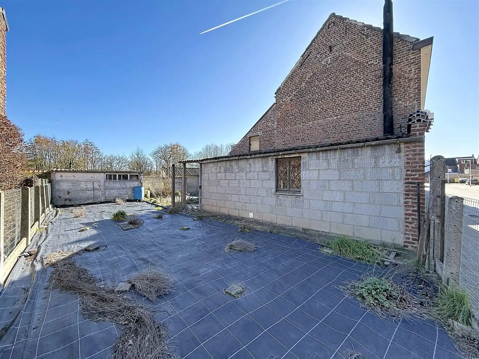 Te renoveren woning met garage en tuin, opp 2a 40ca foto 4