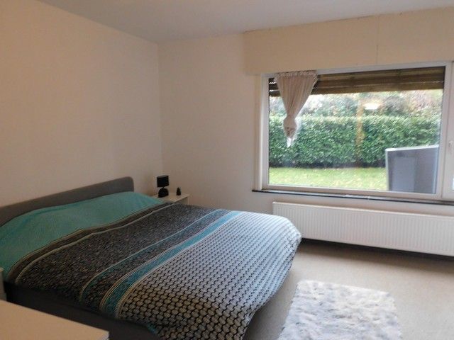 Knus gelijkvloers appartement met tuin  foto 7