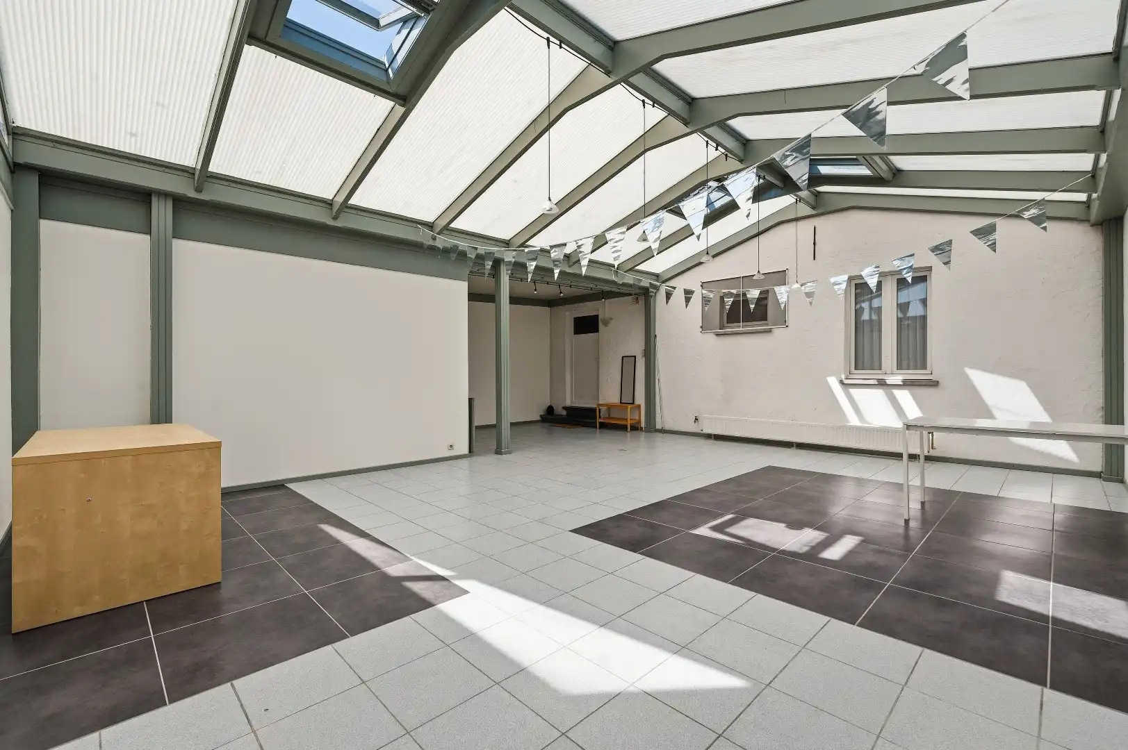 Ruime instapklare duplex met 3 slpks en praktijk- / hobbyruimte van 55m² foto 4