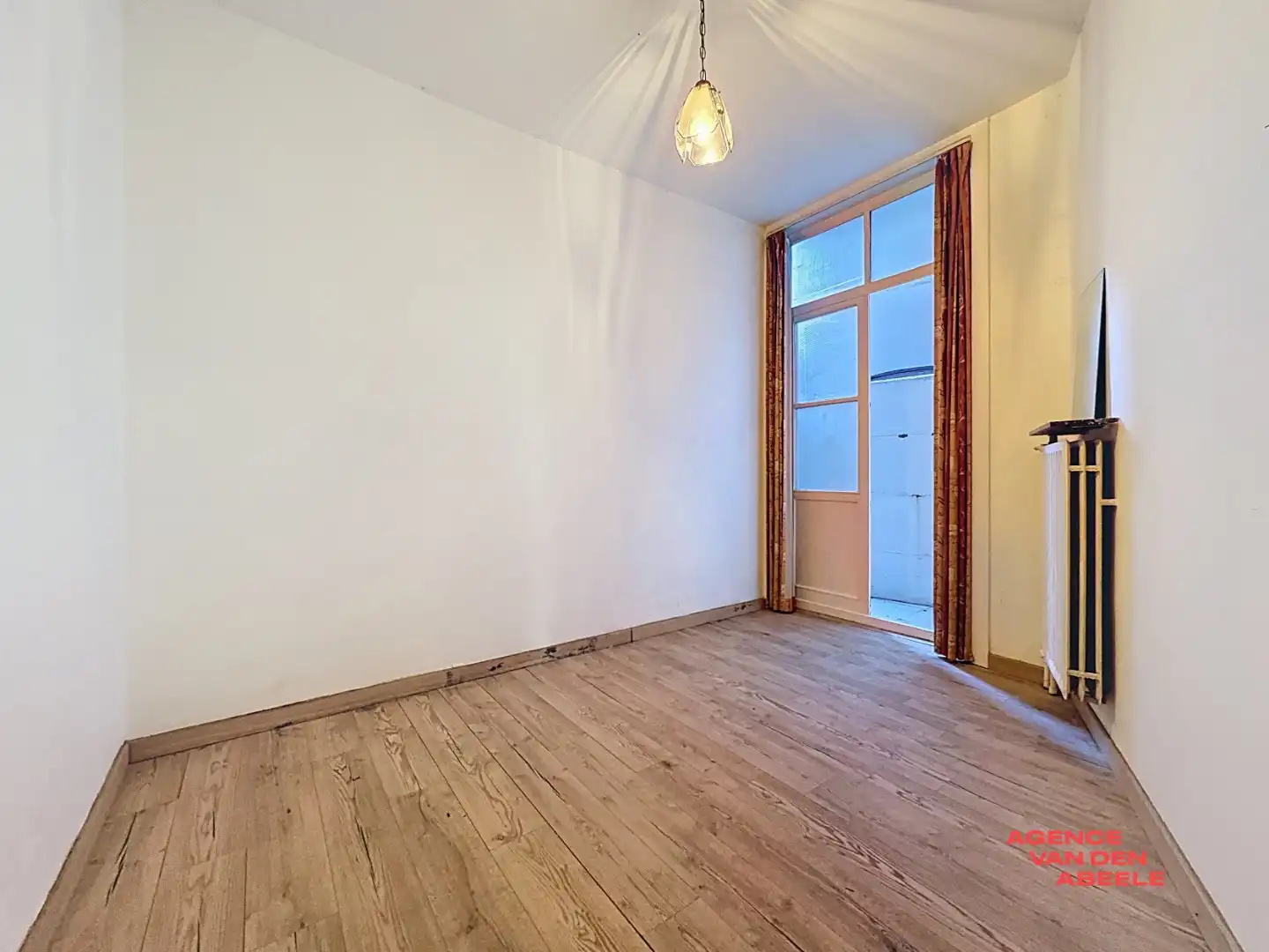 Gelijkvloers appartement vlakbij Sint-Annakwartier foto 7