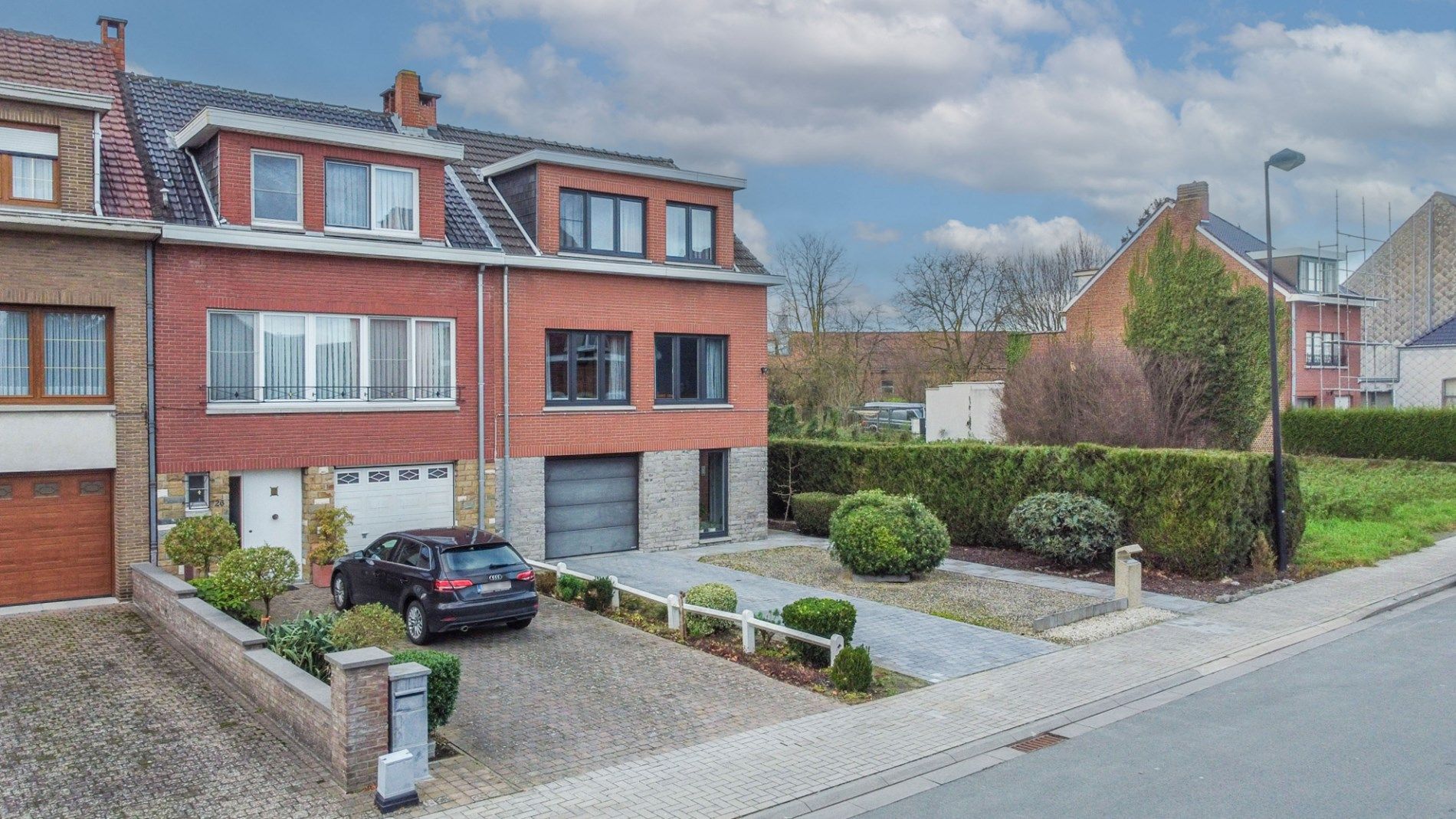 Solide en energiezuinige 3-gevel woning met aangename tuin! foto 3