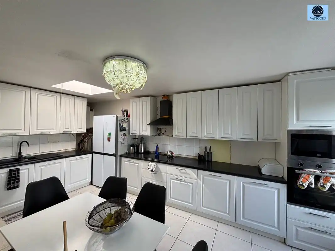 LEUKE  STADSWONING MET 4 SLAAPKAMERS  EN TUIN foto 6
