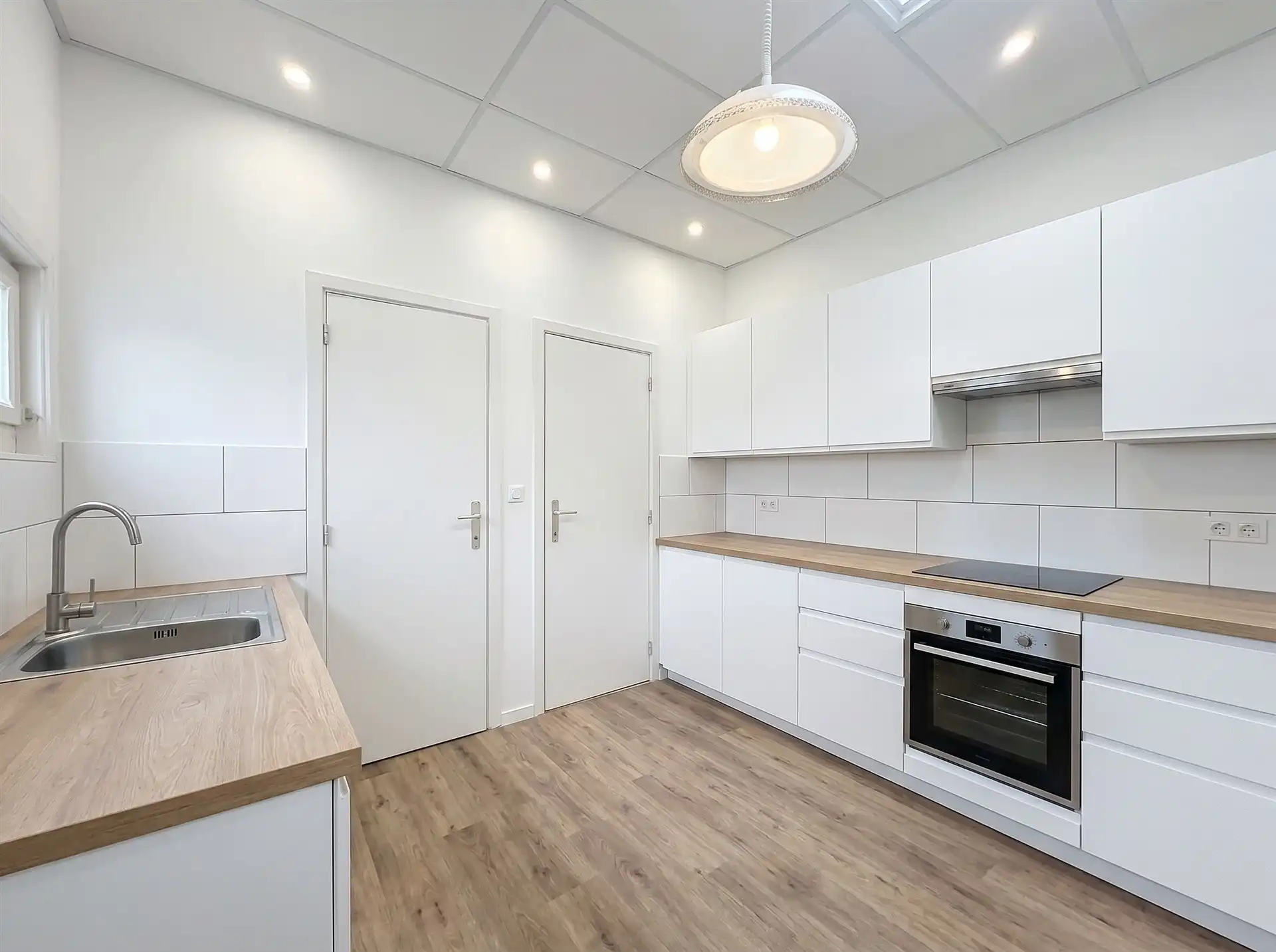 Ruime woning met veel potentieel, garage en tuin in het centrum van Beveren! foto 10