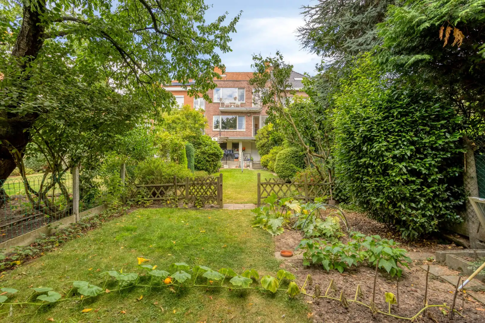 Opbrengsteigendom met tuin en 2 verhuurde appartementen in Wemmel foto 24