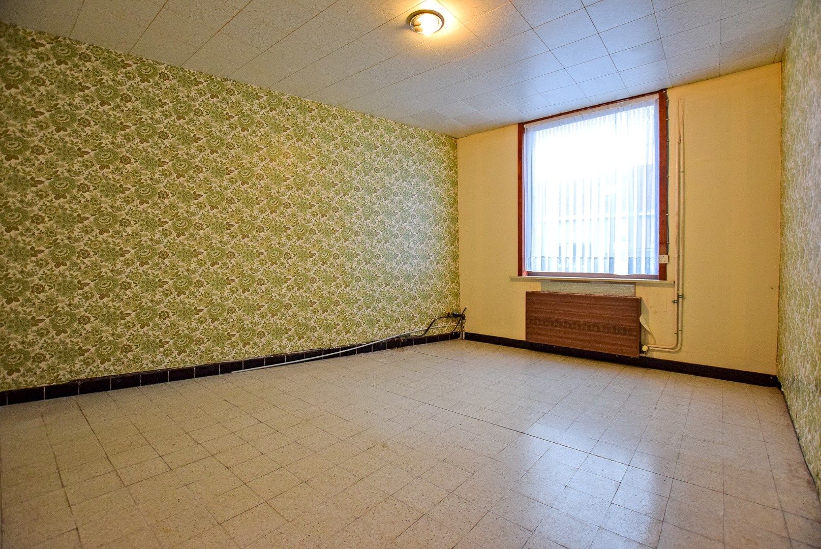 Gezellige woning te koop in Hoogstade met zongerichte tuin en zijtoegang. foto 11