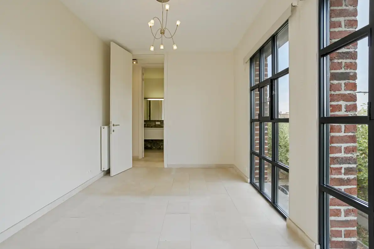 Stijlvol appartement in iconisch gebouw met ruim terras in hartje Aalst foto 9