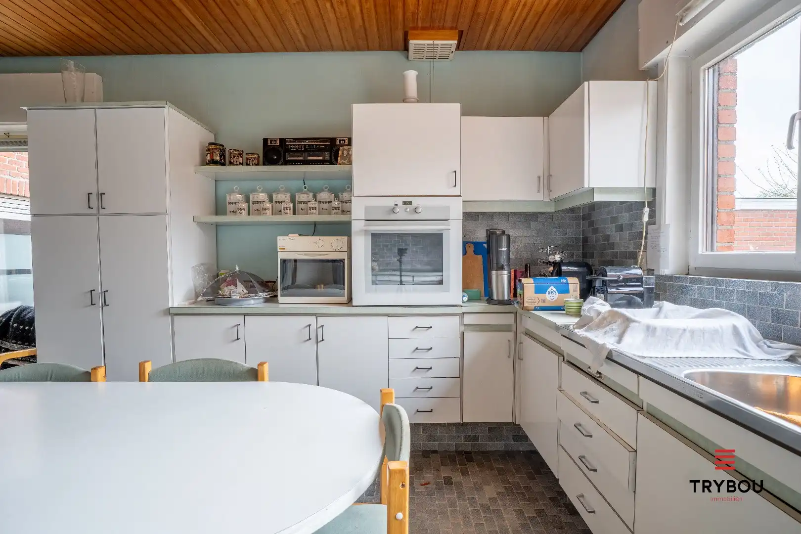 Ruime woning met winkelruimte, loods (optioneel) en garage  foto 9