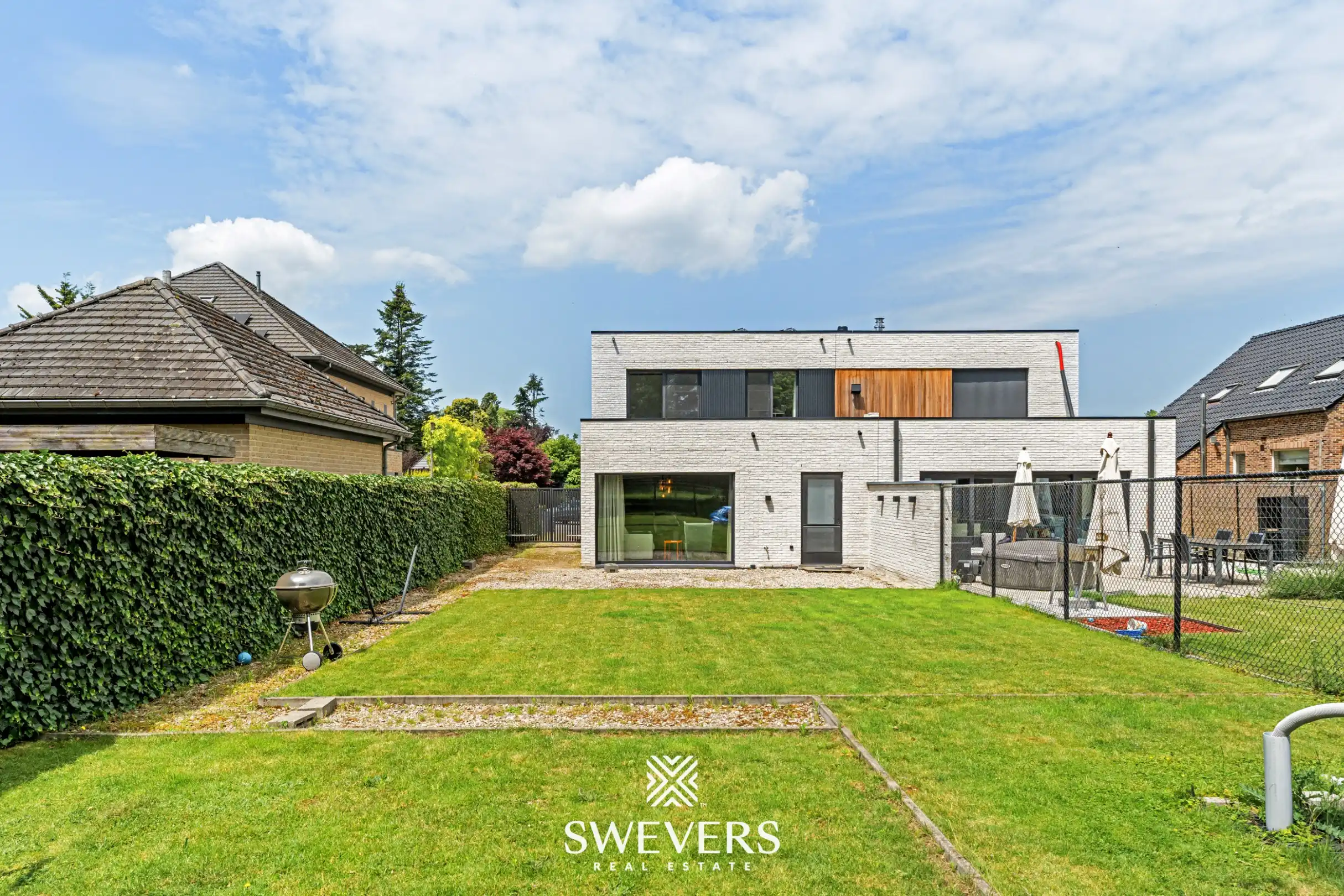 Recente halfopen bebouwing met 5 slaapkamers met verrassend grote tuin in Houthalen foto 24
