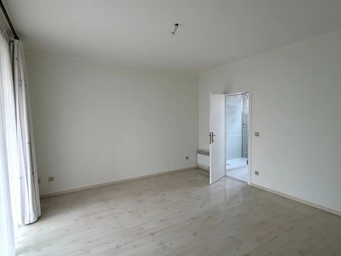Ruim en lichtrijk appartement  (ca. 100m2) met autostaanplaats centrum Leuven foto 15