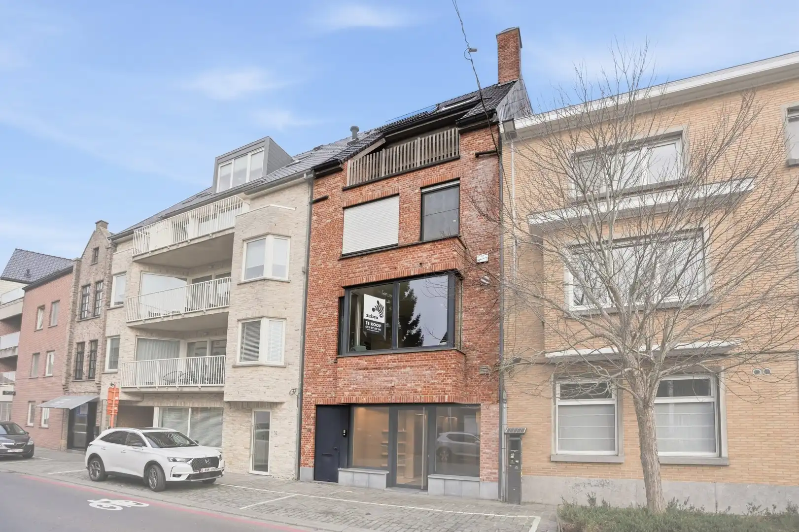 Eigentijdse woning met lift, terras en topafwerking in het centrum van Roeselare! foto 3
