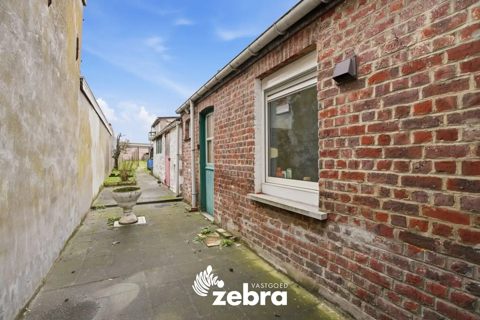 Te renoveren woning met tuin op centrale ligging in Tielt! foto 16