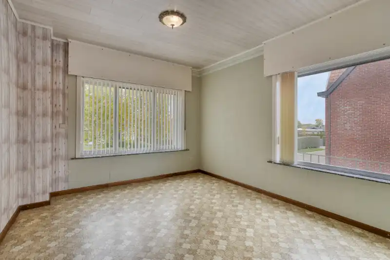 HALFOPEN BEBOUWING MET VEEL RENOVATIEPOTENTIEEL EN RUIM DAKTERRAS foto 18