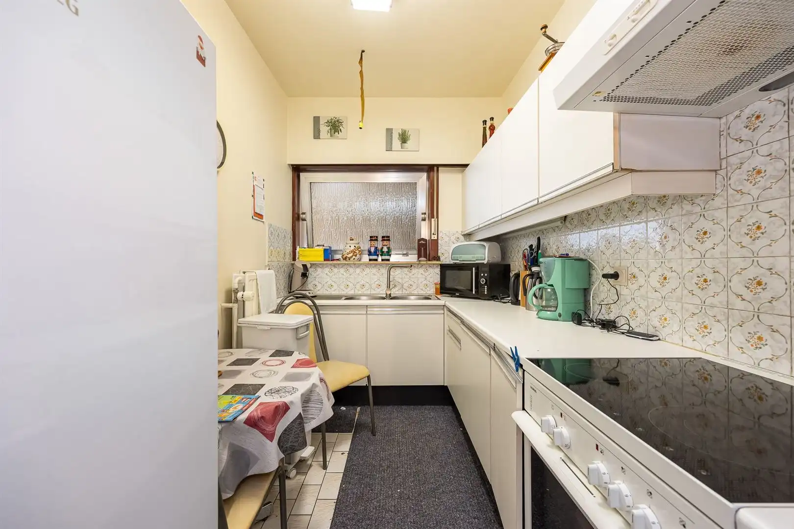 Opbrengsteigendom met 5 appartementen en garages foto 46