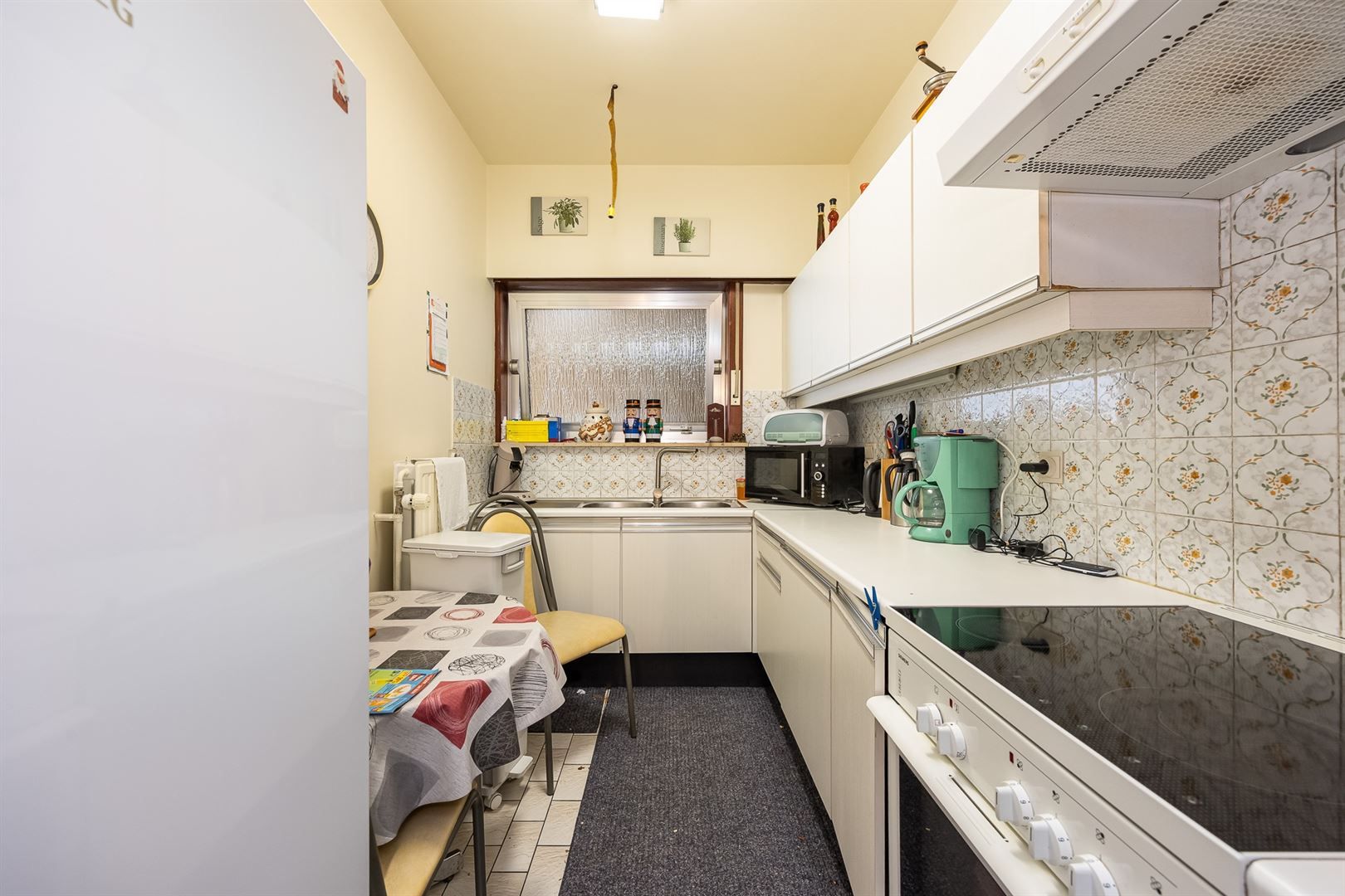 Opbrengsteigendom met 5 appartementen en garages foto 46
