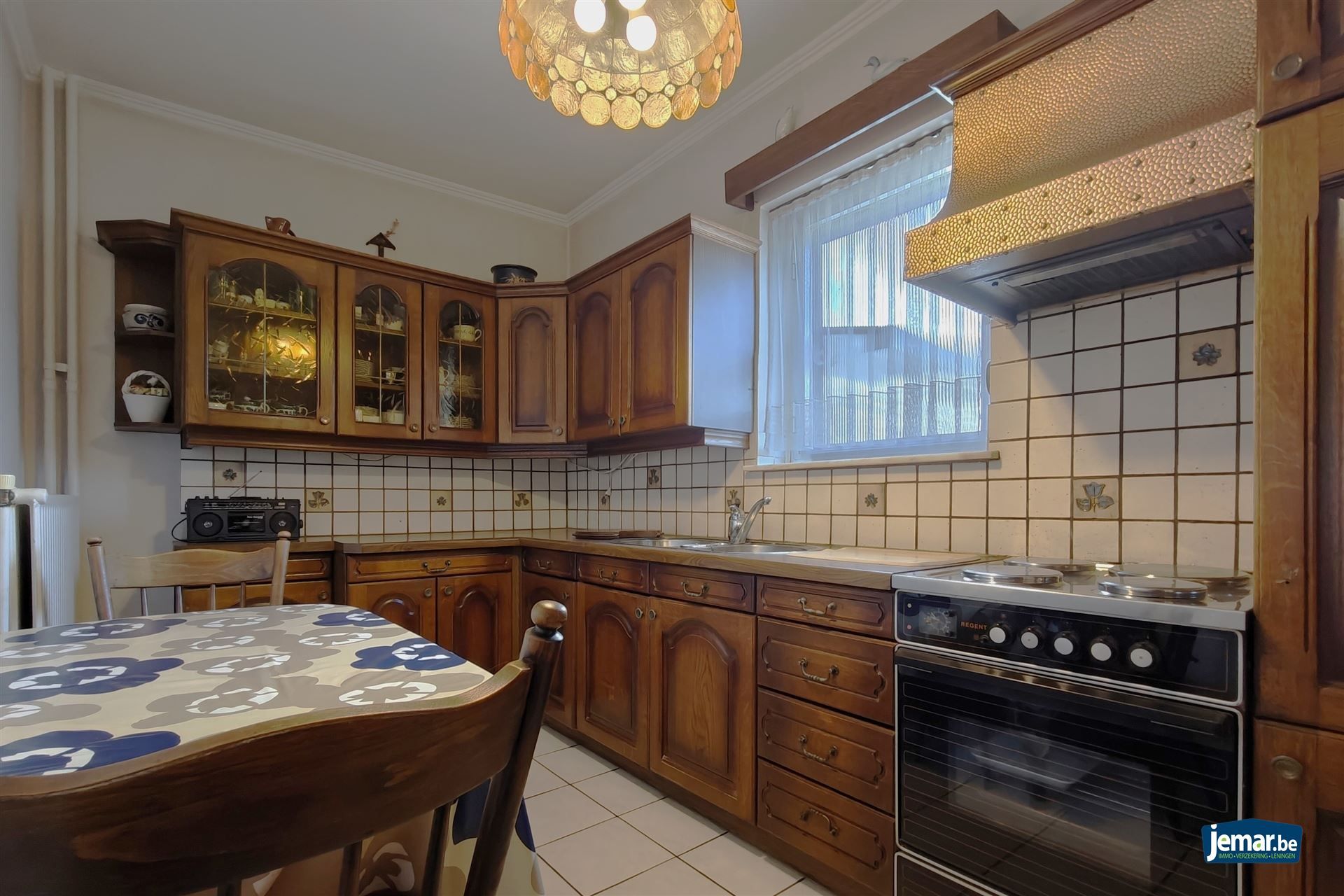 Goed onderhouden woning met 3 slpk. en 2 ingangen in Mopertingen foto 6