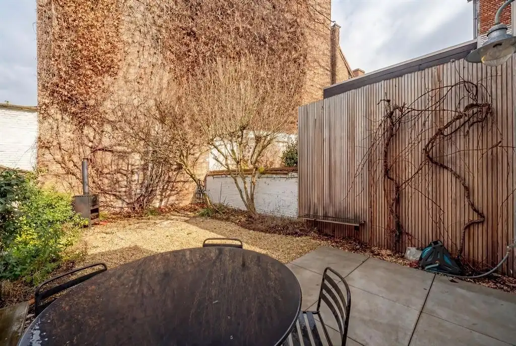 Sfeervol, instapklaar herenhuis met 4 slaapkamers & mediterraanse tuin in hartje Harmoniewijk foto 4