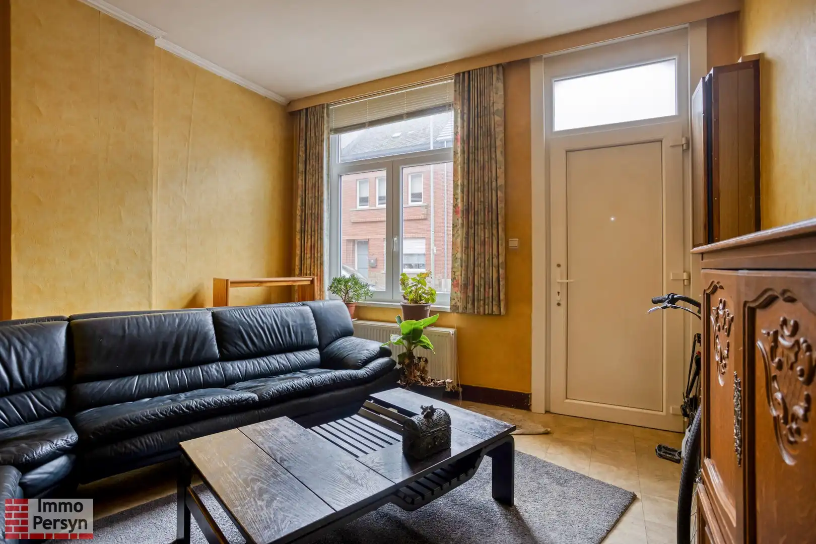 Te renoveren rijwoning met uitbreidingsmogelijkheden en tuin met achteruitgang foto 2