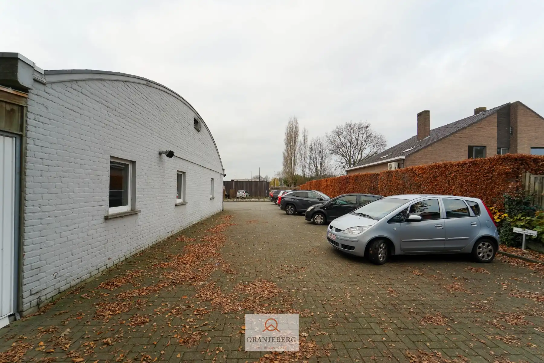Ruim handelspand met meerdere ruimtes en parking te huur in centrum Drongen foto 12