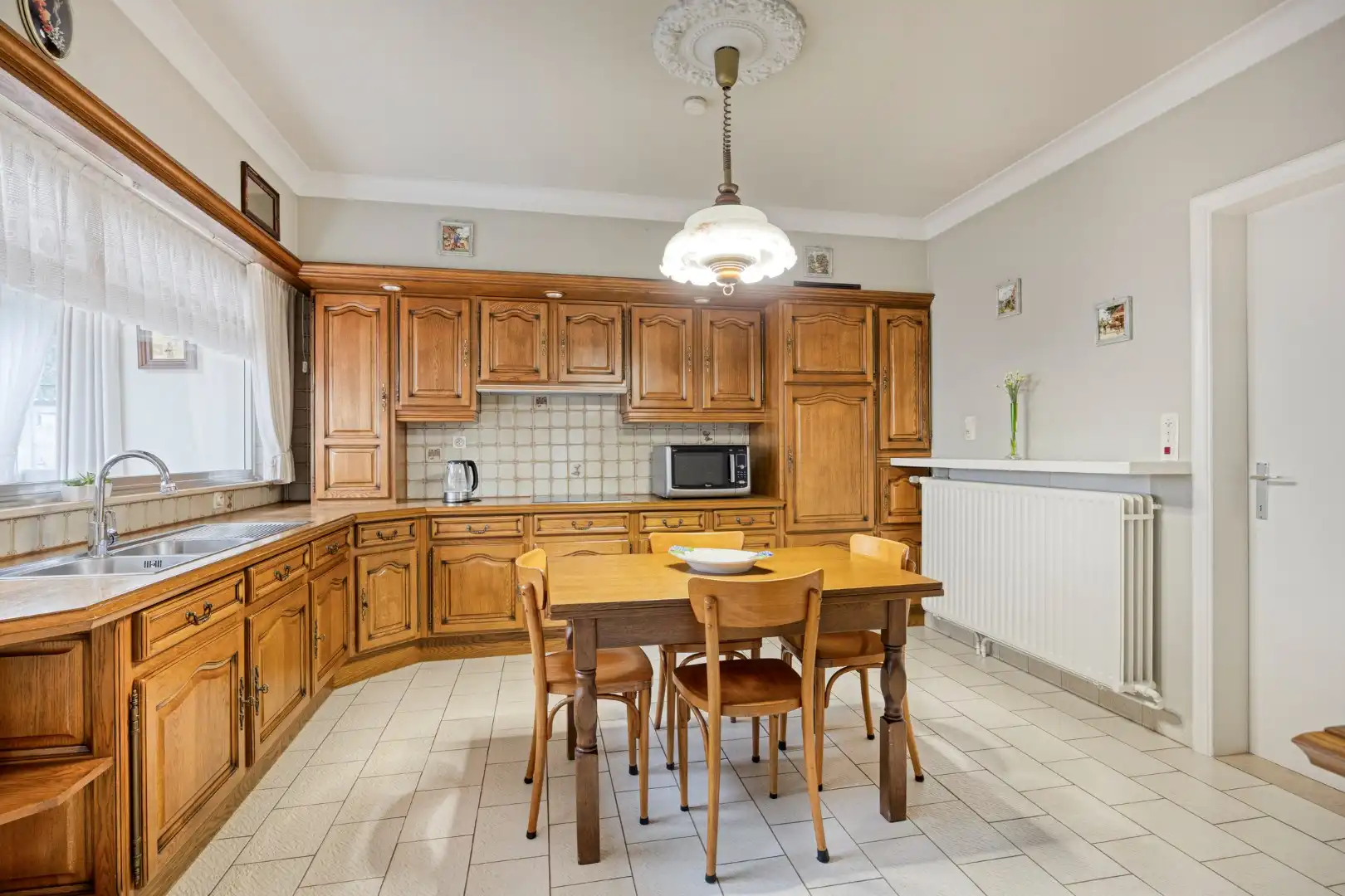 Ruim ingedeelde gelijkvloers woning op een mooi breed perceel van 812 m². foto 10