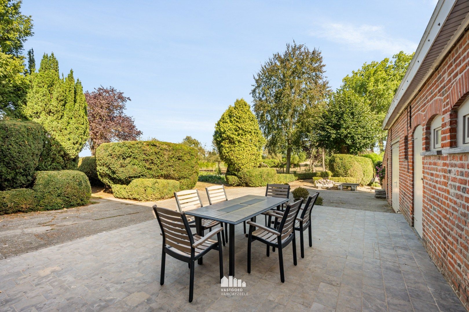Woning met prachtig open zicht op tuin/weide en achterliggende velden – perceel van 1,67 HA foto 5