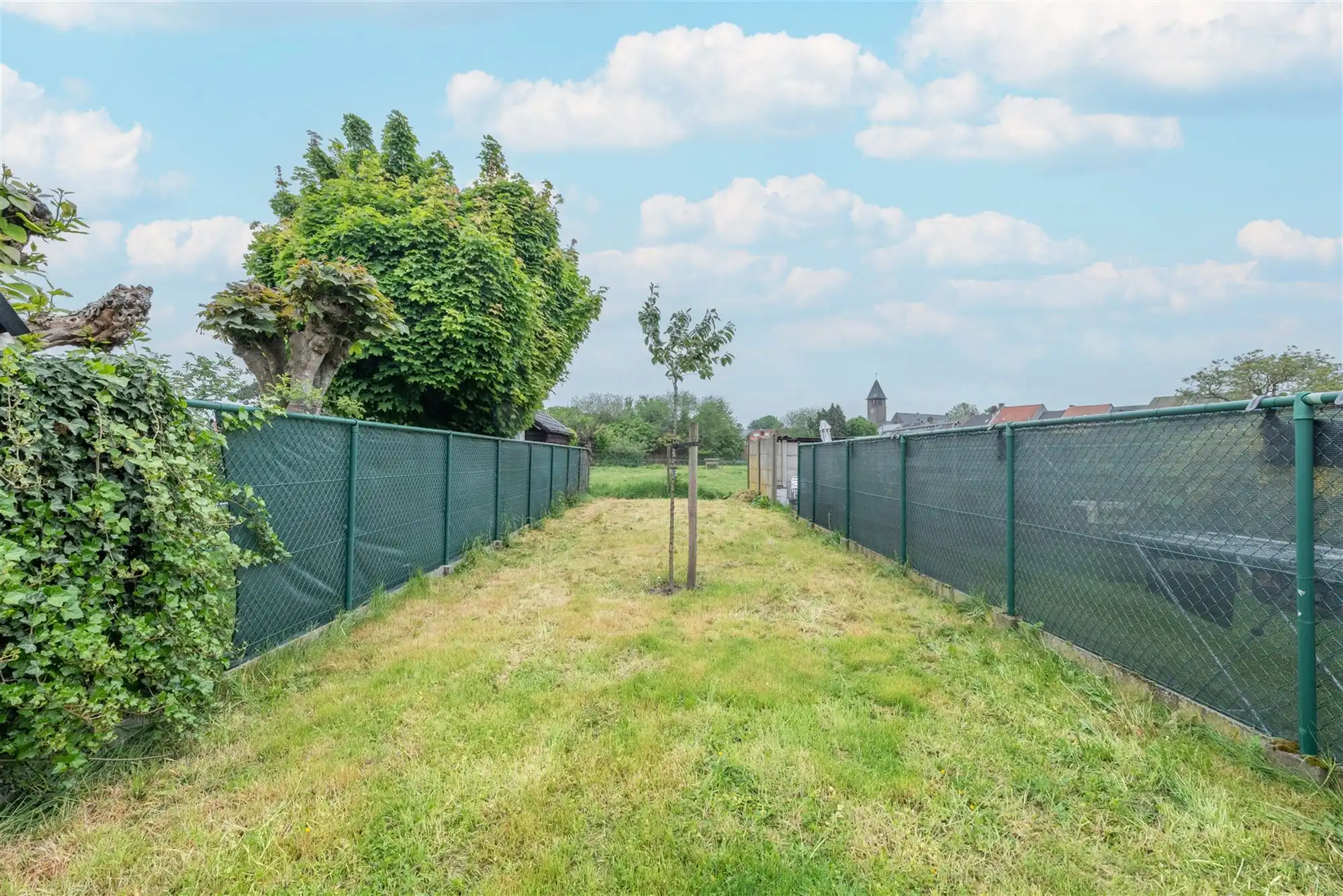 rustig gelegen gezinswoning met 4 slpks, garage en tuin foto 13