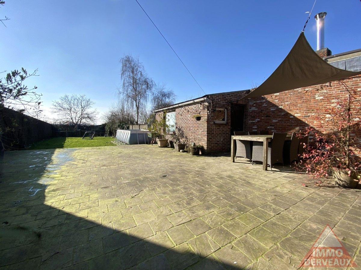 Zonnebeke - Instapklare woning met zongerichte tuin en zijingang foto 12