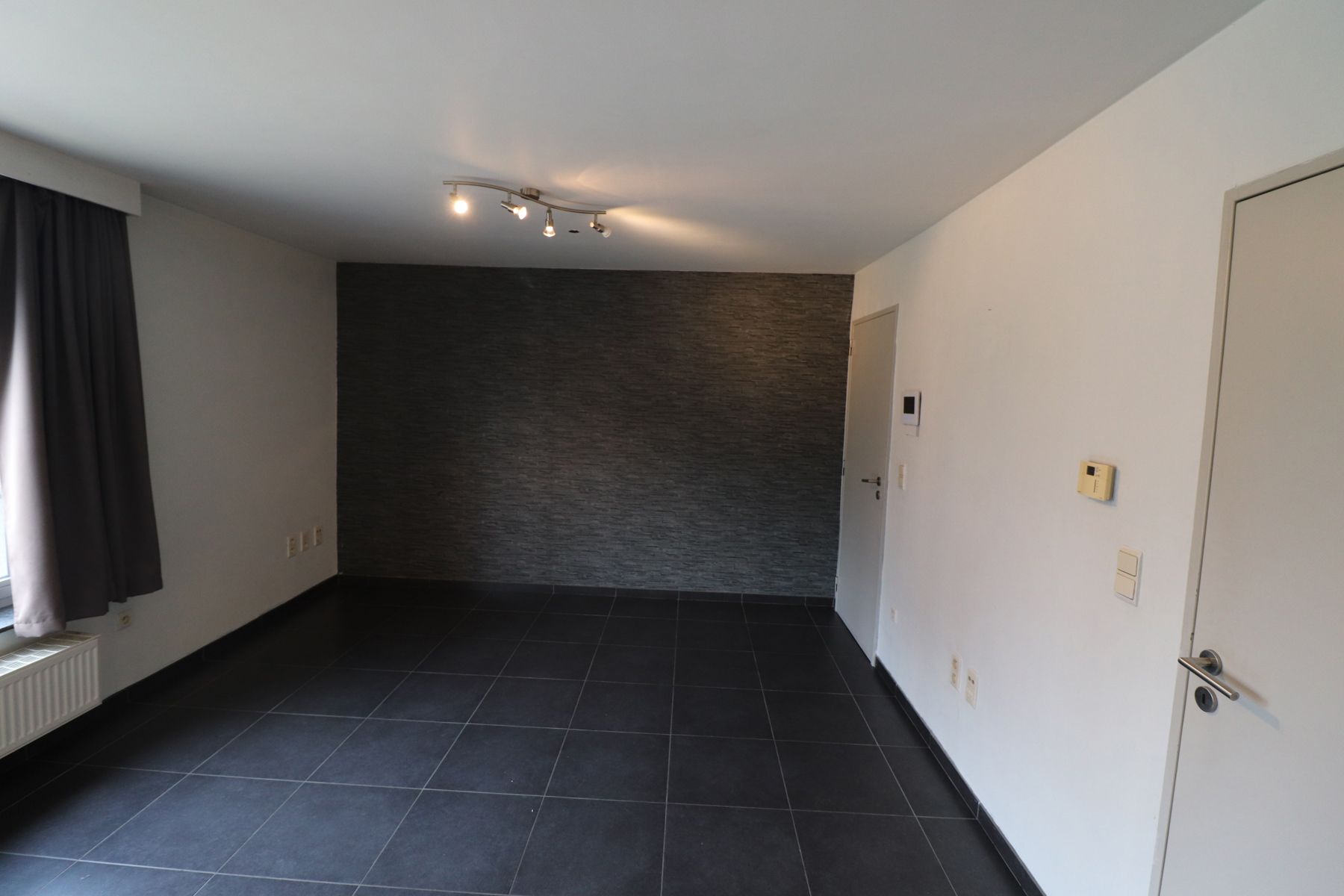 Een gezellig appartement op de eerste verdieping vooraan met autostaanplaats foto 3